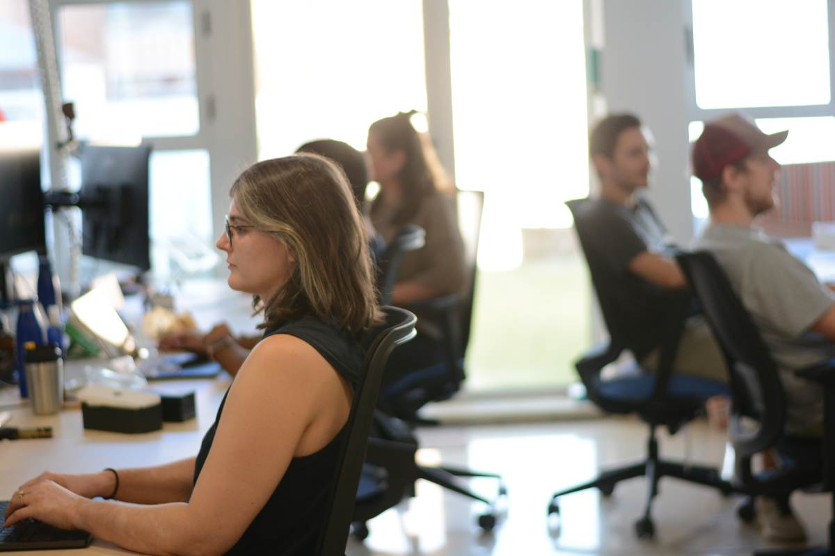 Delcom team working in office